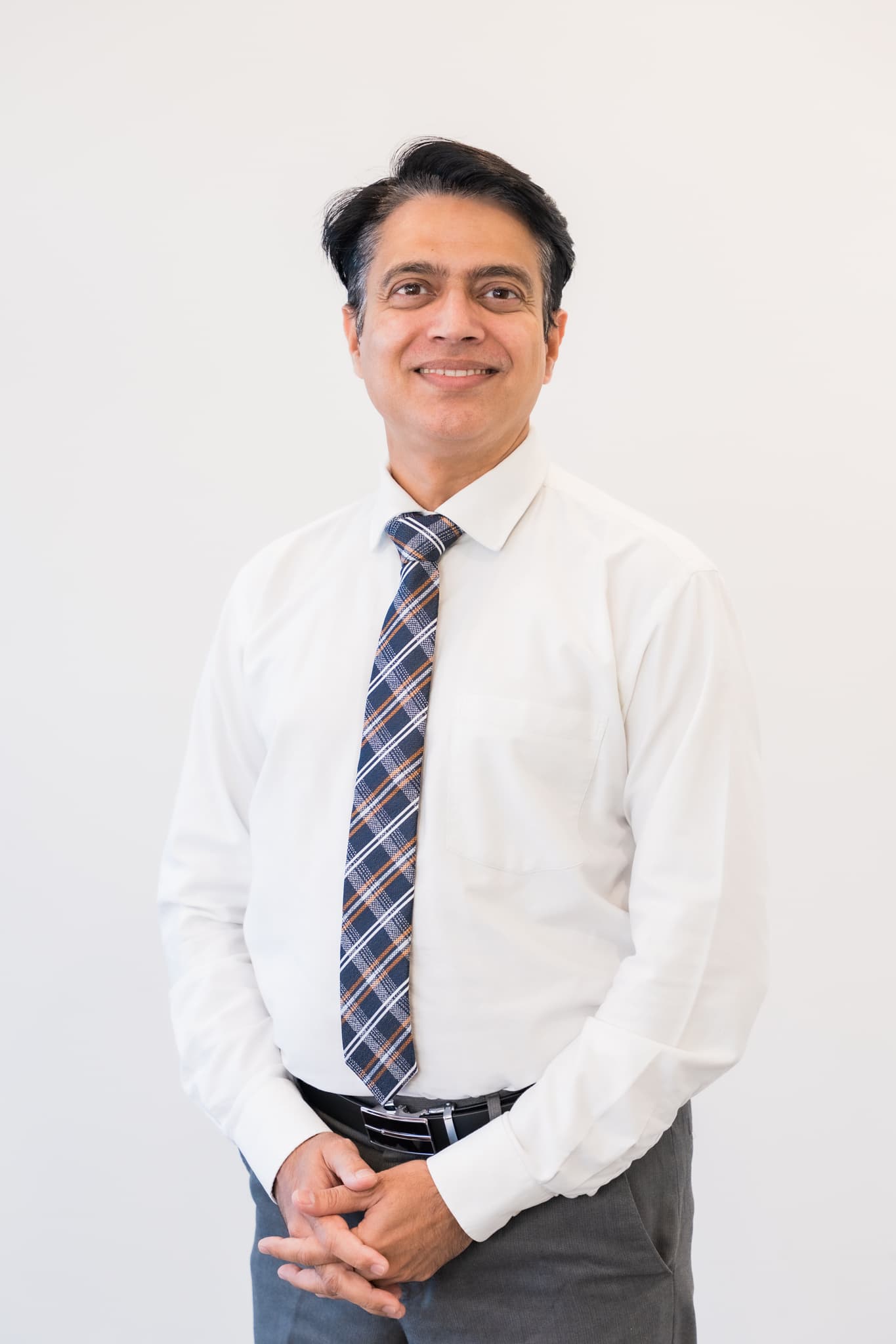 Dr Rajeev Bhandare Warner dentist at Exquisite Smiles clinic