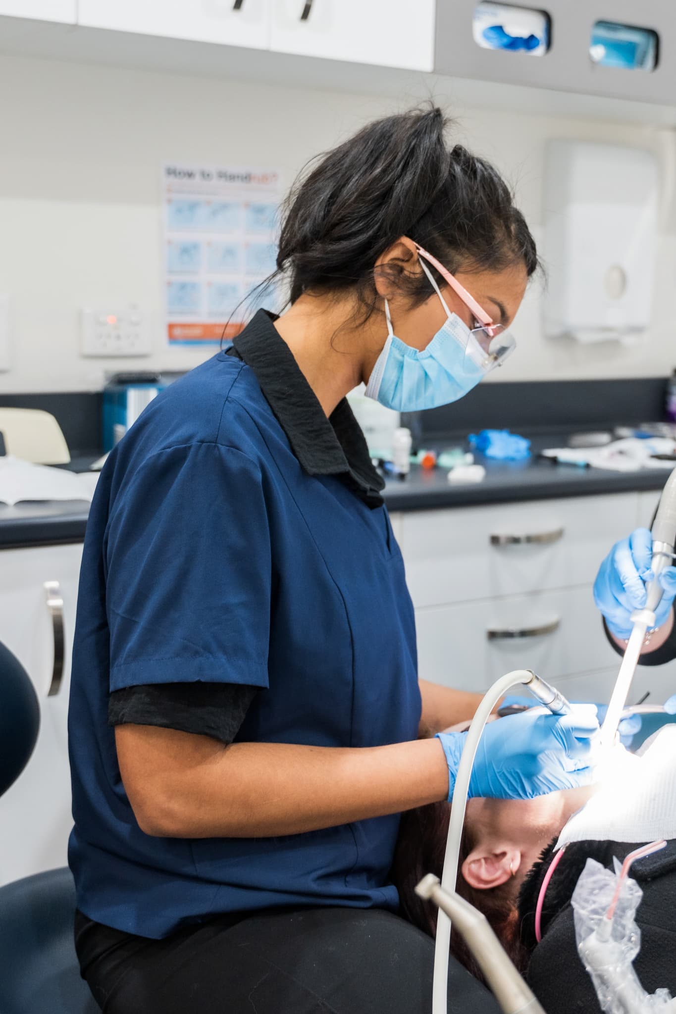 Dentist providing gentle sleep dentistry care