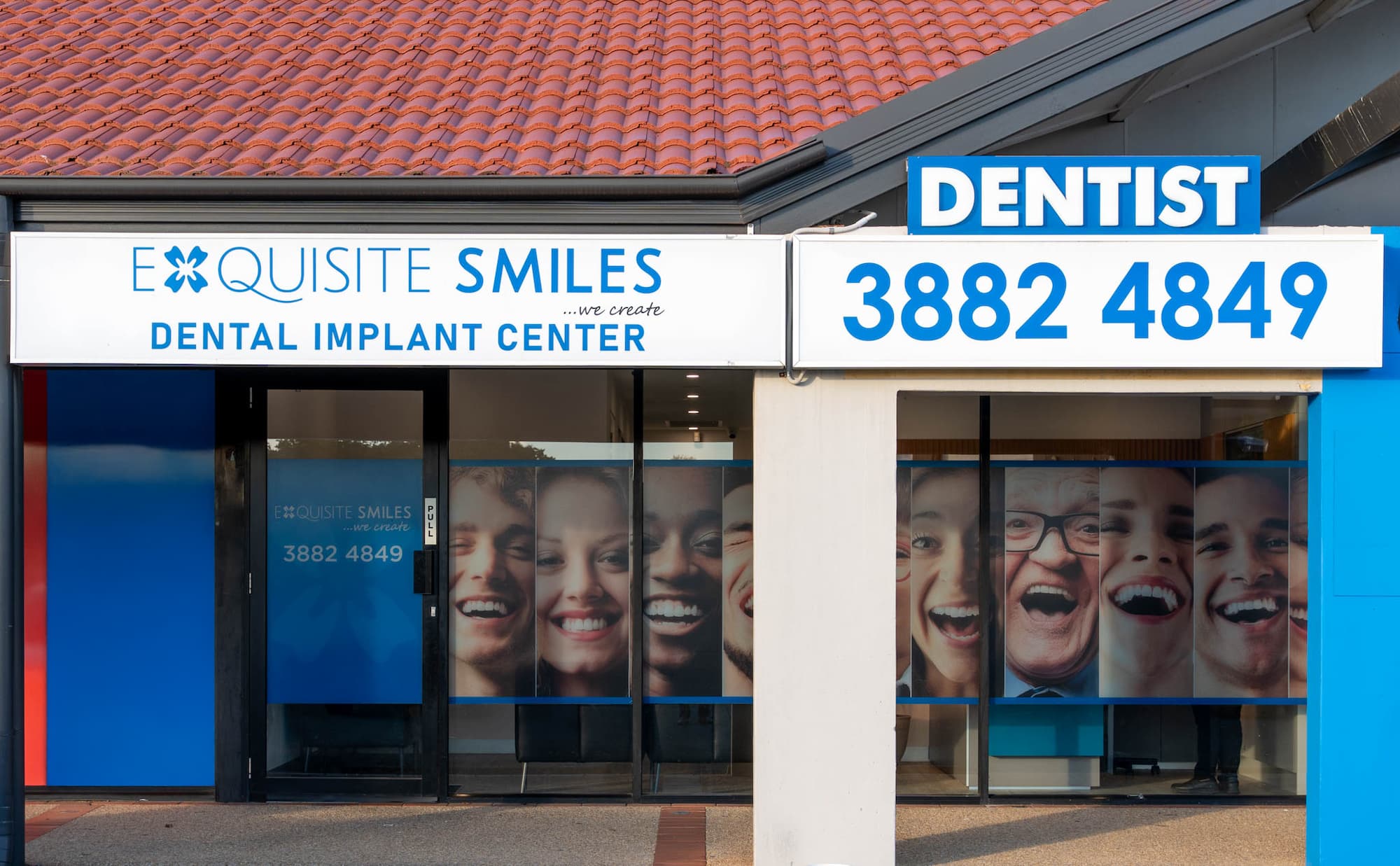 Exquisite Smiles dental clinic exterior in Warner with signage and smiling faces